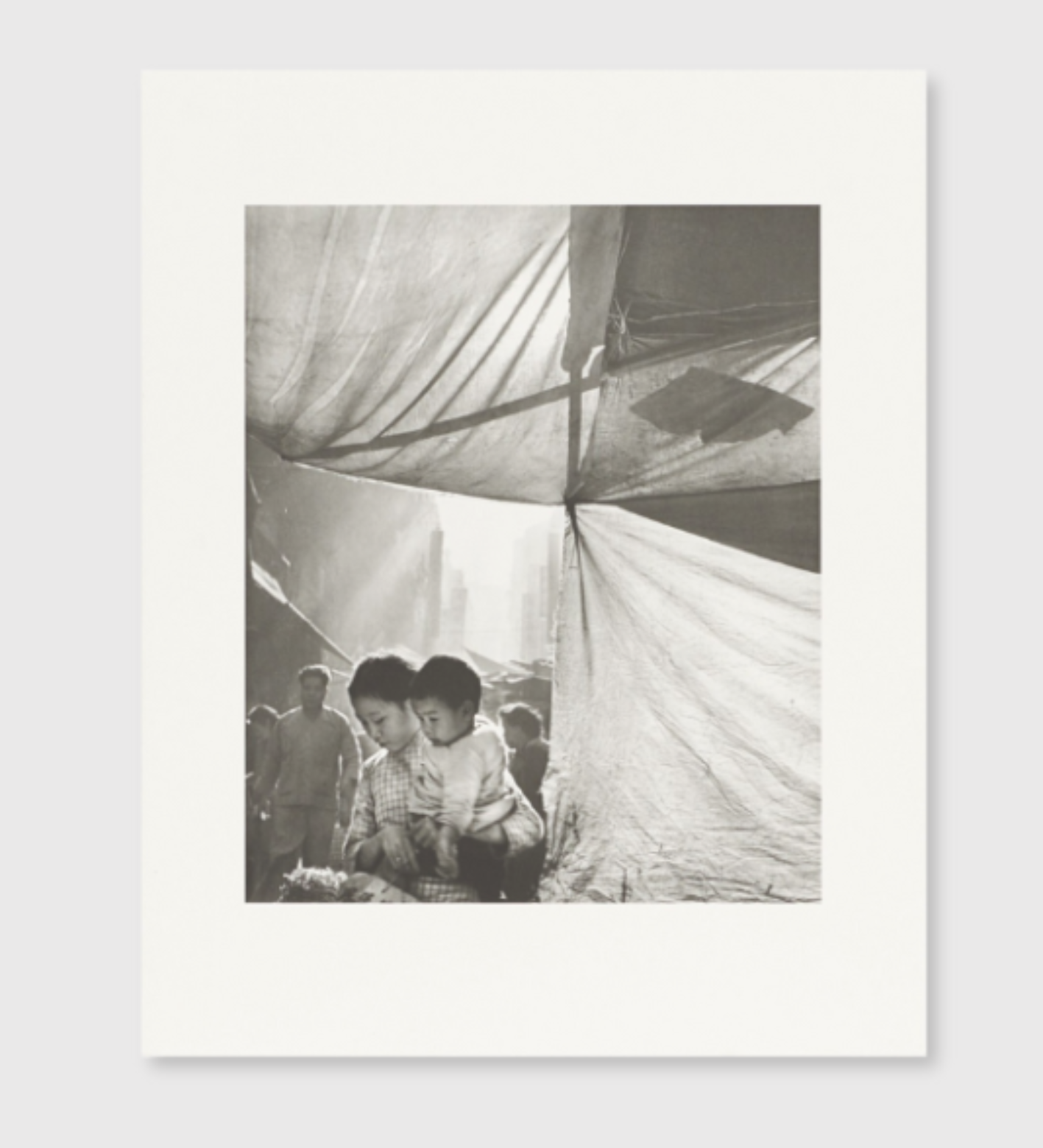 Fan Ho: Hong Kong Street Life Collotype Portfolio